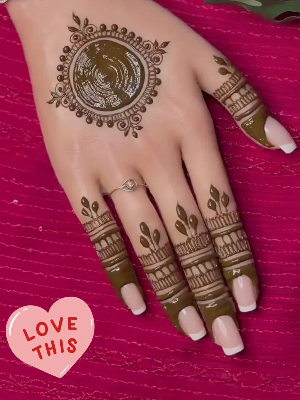 Aesthetic Royal Back Hand Mehndi Design with Gol Tikki, Hearts and Jaal