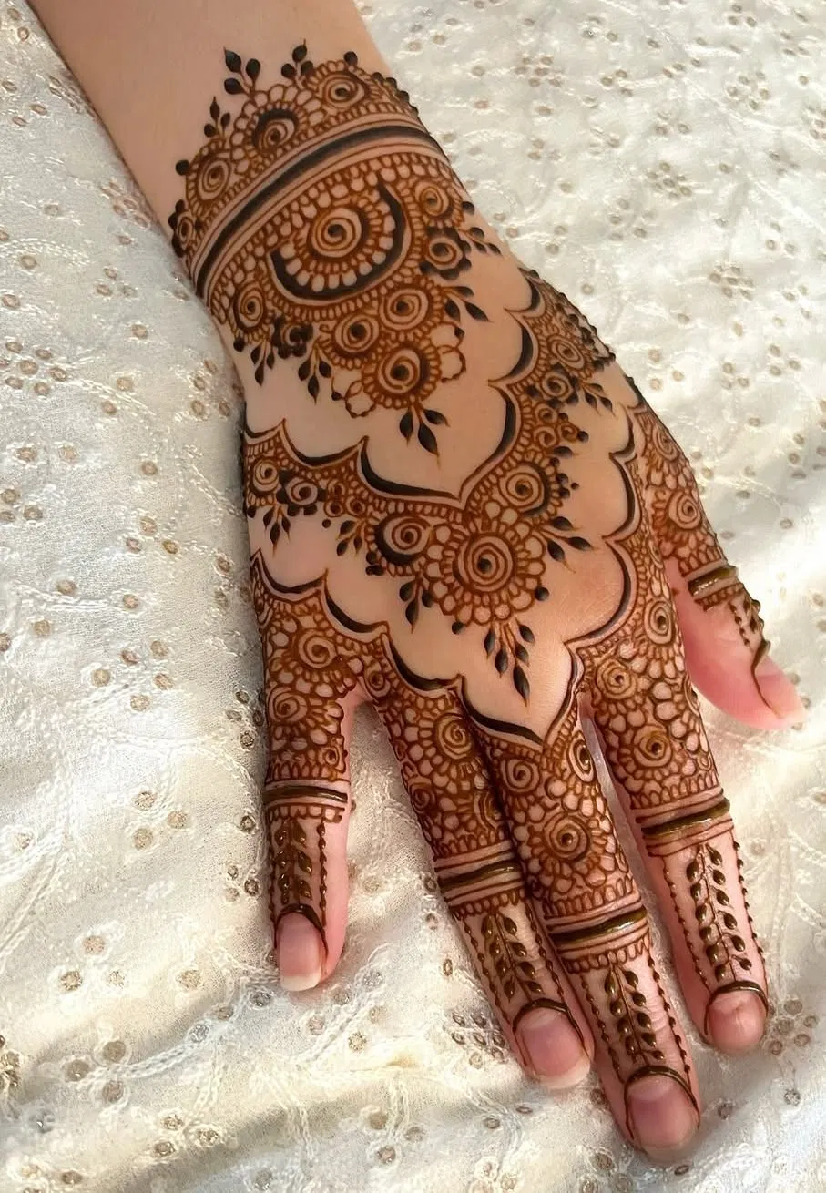 Aesthetic Arabic Back Hand Mehndi Design with Bel, Flowers and Jaal for Diwali
