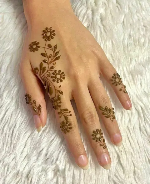 aesthetic arabic flower back hand mehndi design