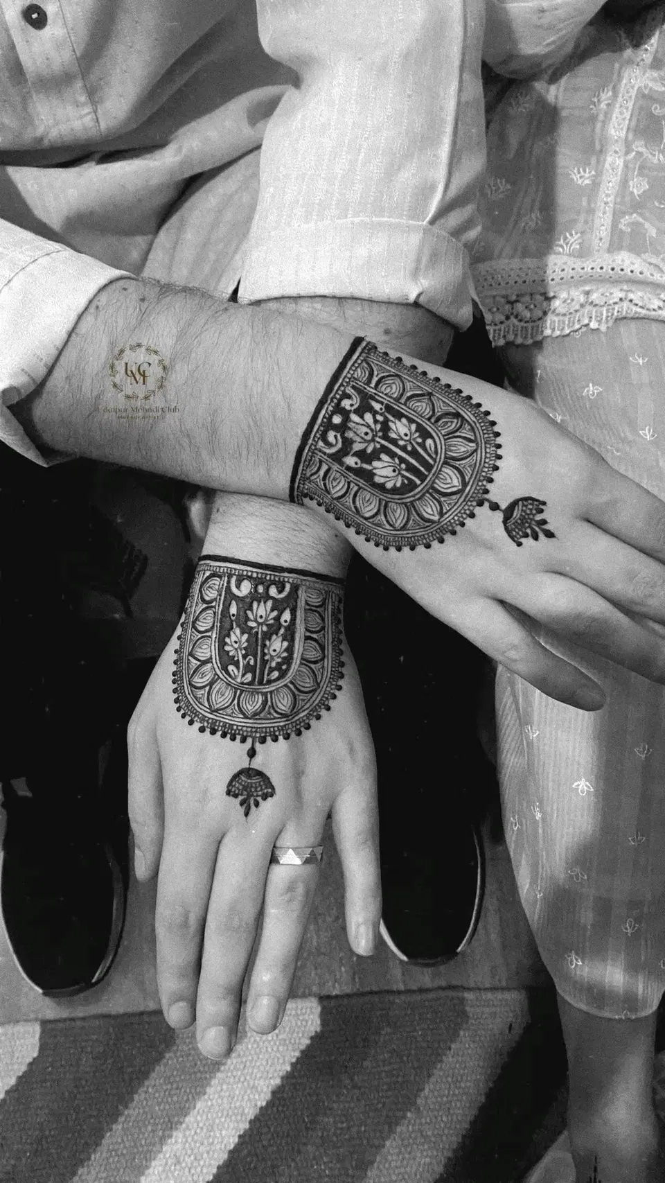 Minimal Simple Back Hand Mehndi Design with Deity, Figures and Lotus