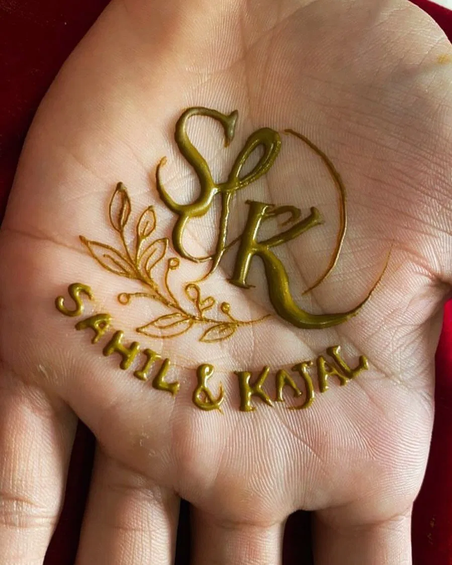 Bridal Royal Back Hand Mehndi Design with Deity and Hidden Name