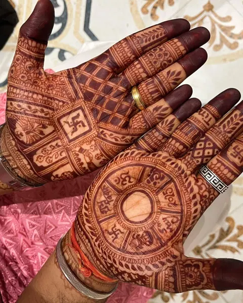 bridal royal deity back hand mehndi design