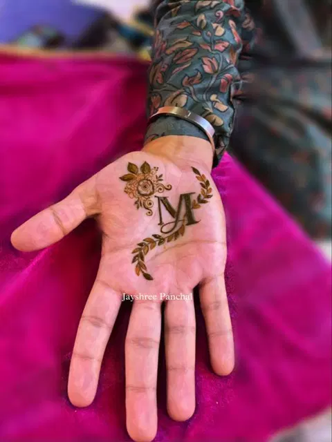 bridal simple deity arm mehndi design