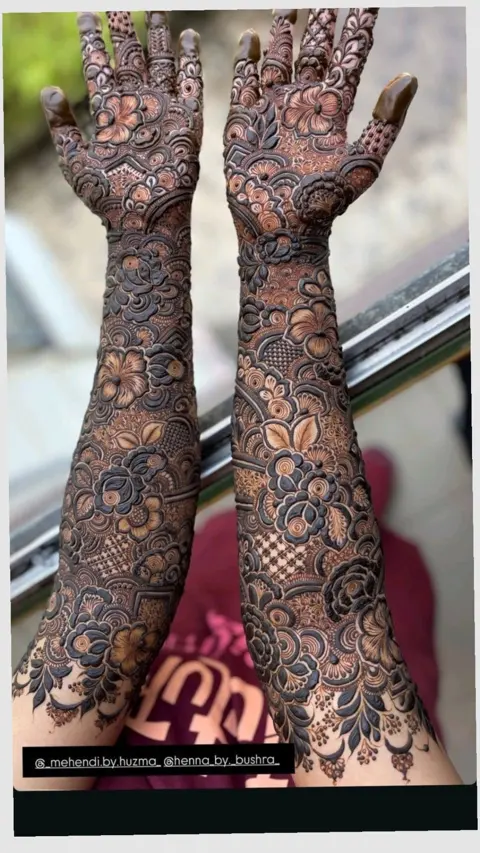 arabic bridal figure back hand mehndi design