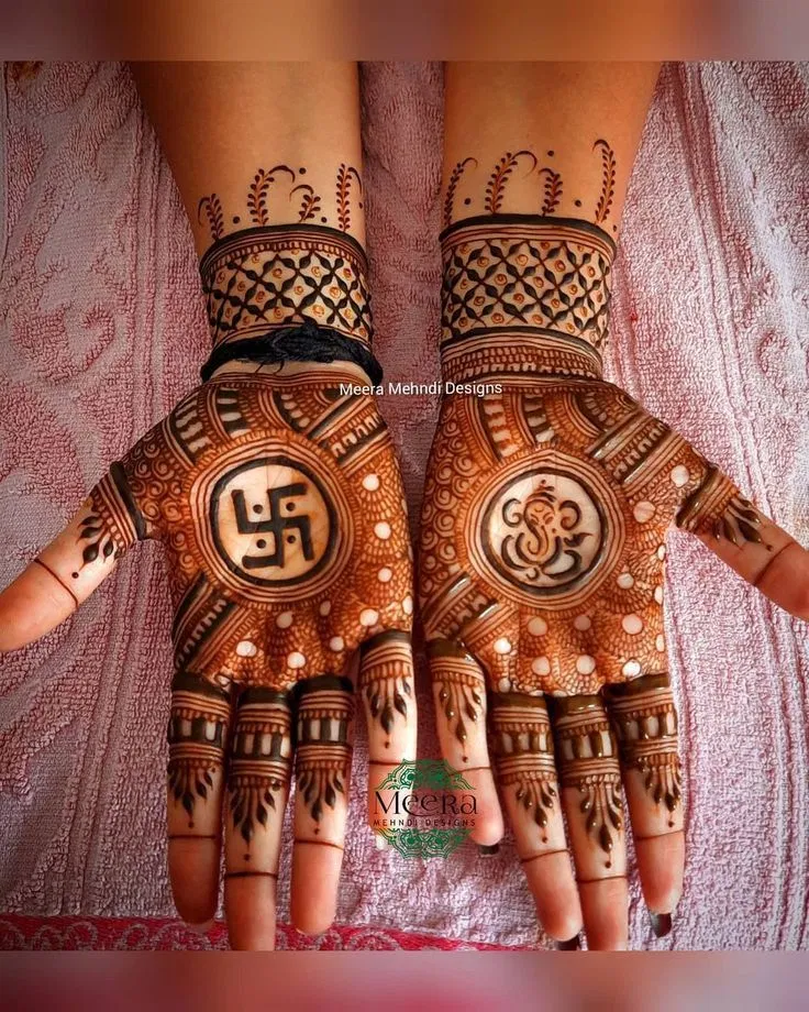 Bridal Back Hand Mehndi Design with Deity, Figures and Hidden Name