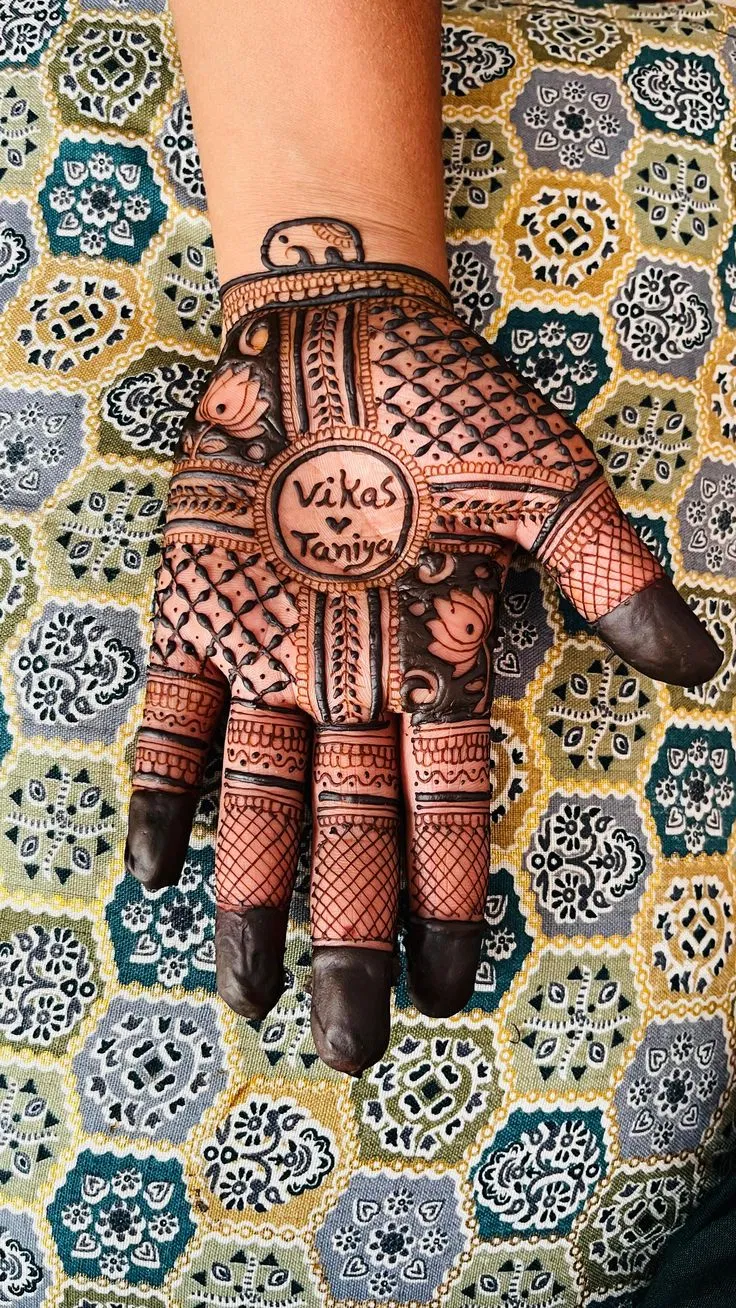 Bridal Back Hand Mehndi Design with Deity for Engagement