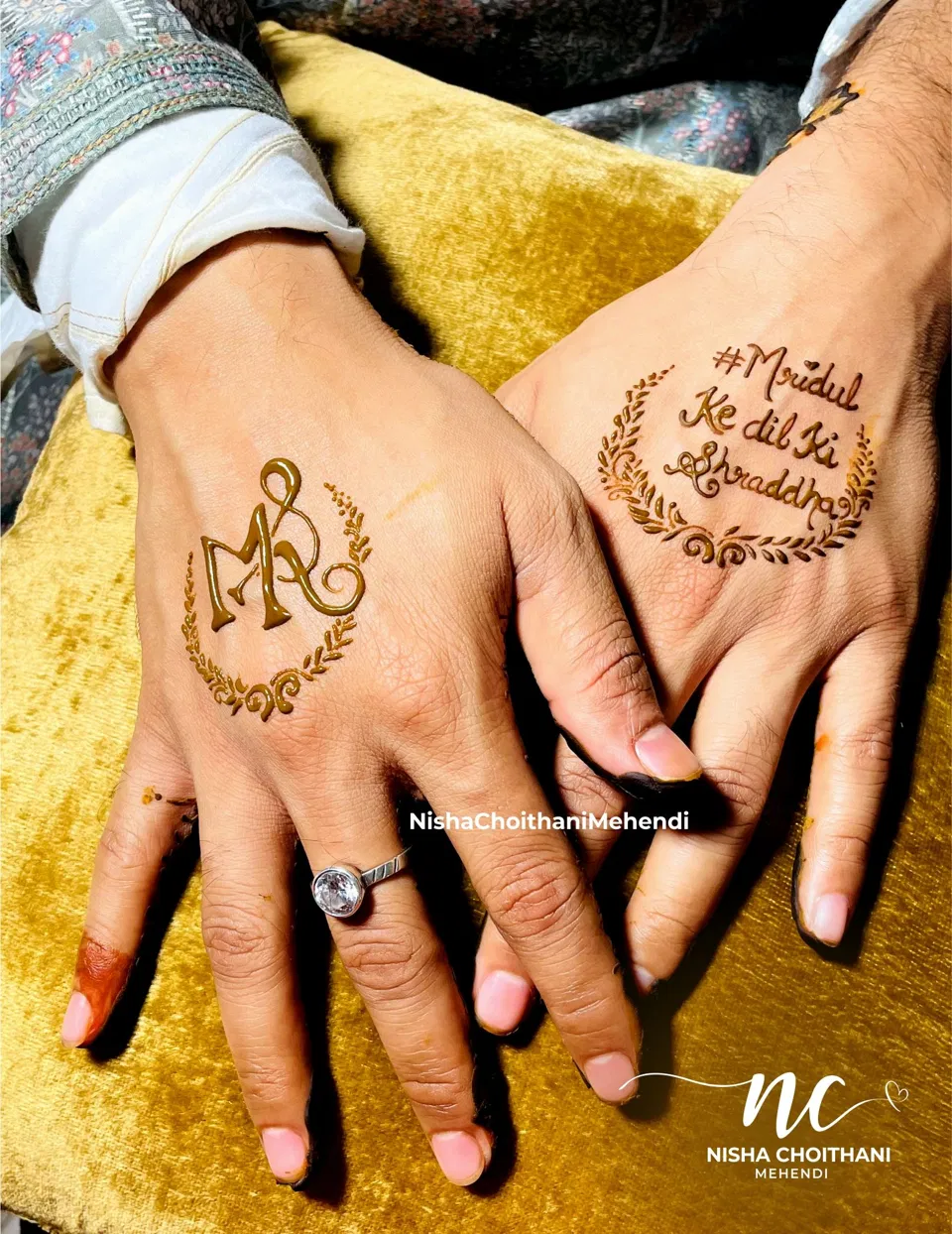 Simple Stylish Back Hand Mehndi Design with Deity, Figures and Hearts for Engagement