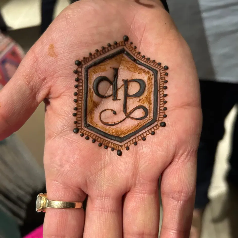 Simple Mehndi Design with Deity and Hidden Name