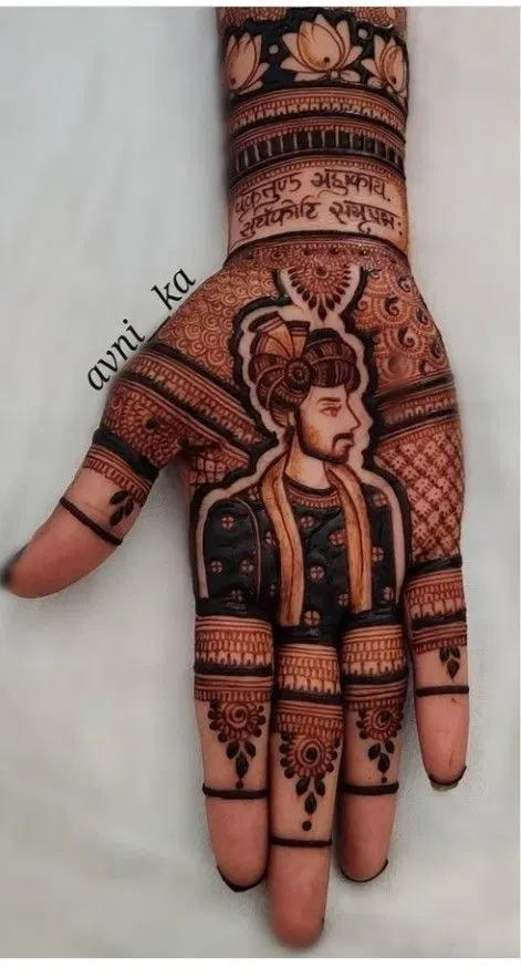 bridal royal deity back hand mehndi design