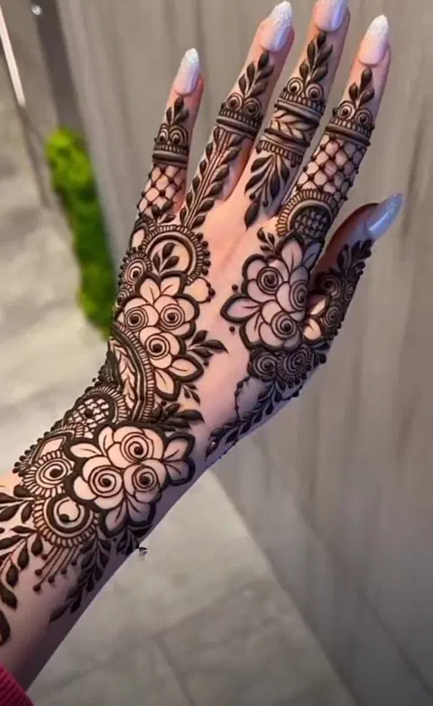 aesthetic arabic flower back hand mehndi design