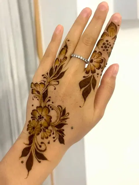 aesthetic arabic flower back hand mehndi design