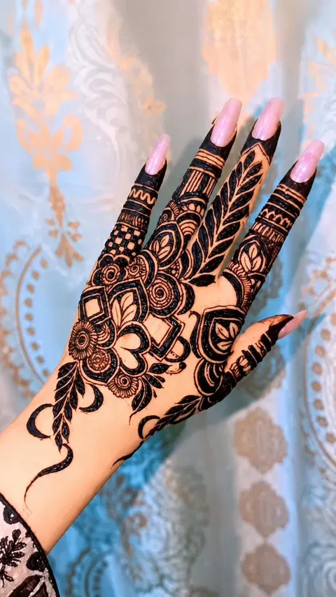 aesthetic arabic flower back hand mehndi design