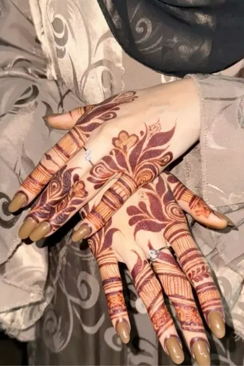 aesthetic arabic flower back hand mehndi design
