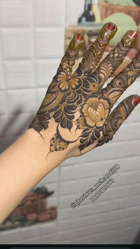 aesthetic arabic flower back hand mehndi design