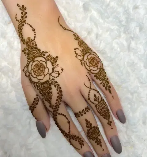 aesthetic arabic flower back hand mehndi design