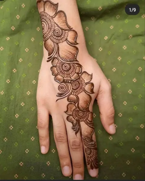 aesthetic arabic bel back hand mehndi design