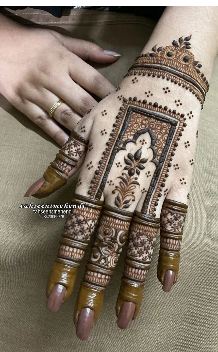 Bridal Indian Back Hand Mehndi Design with Peacock for Eid