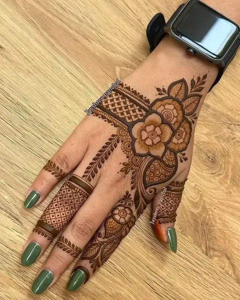 aesthetic arabic flower back hand mehndi design