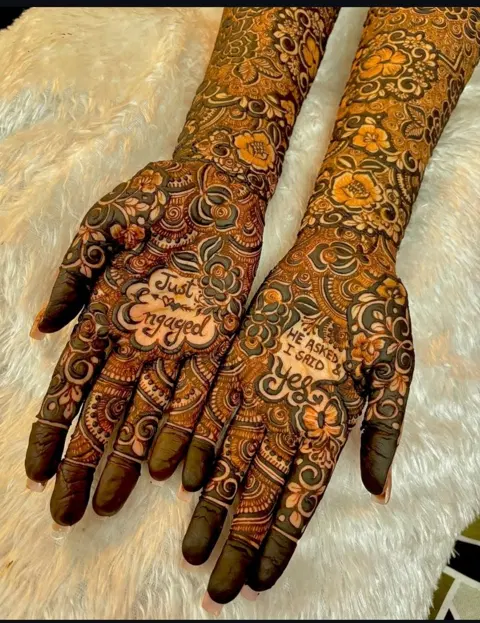 bridal figure back hand mehndi design