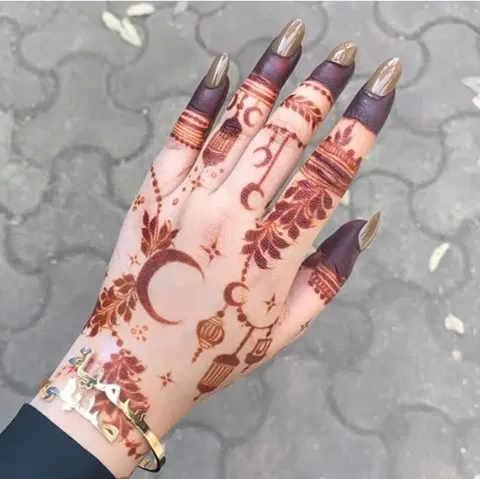 aesthetic simple moon back hand mehndi design