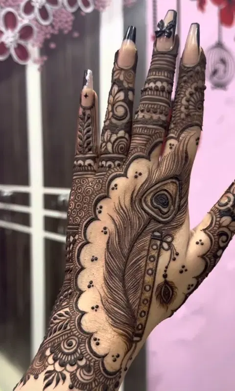 bridal indian deity back hand mehndi design
