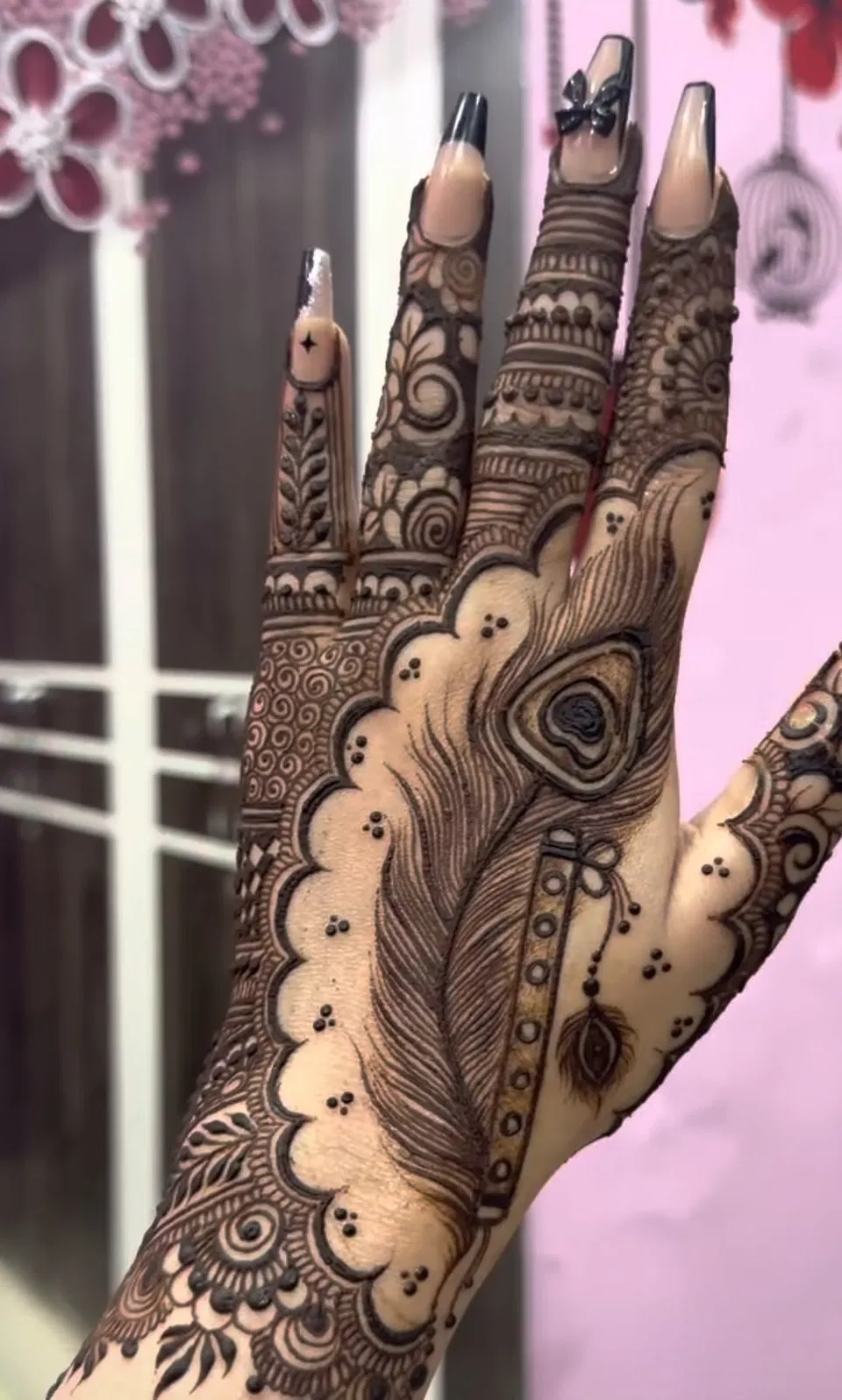 Bridal Indian Back Hand Mehndi Design with Deity and Peacock