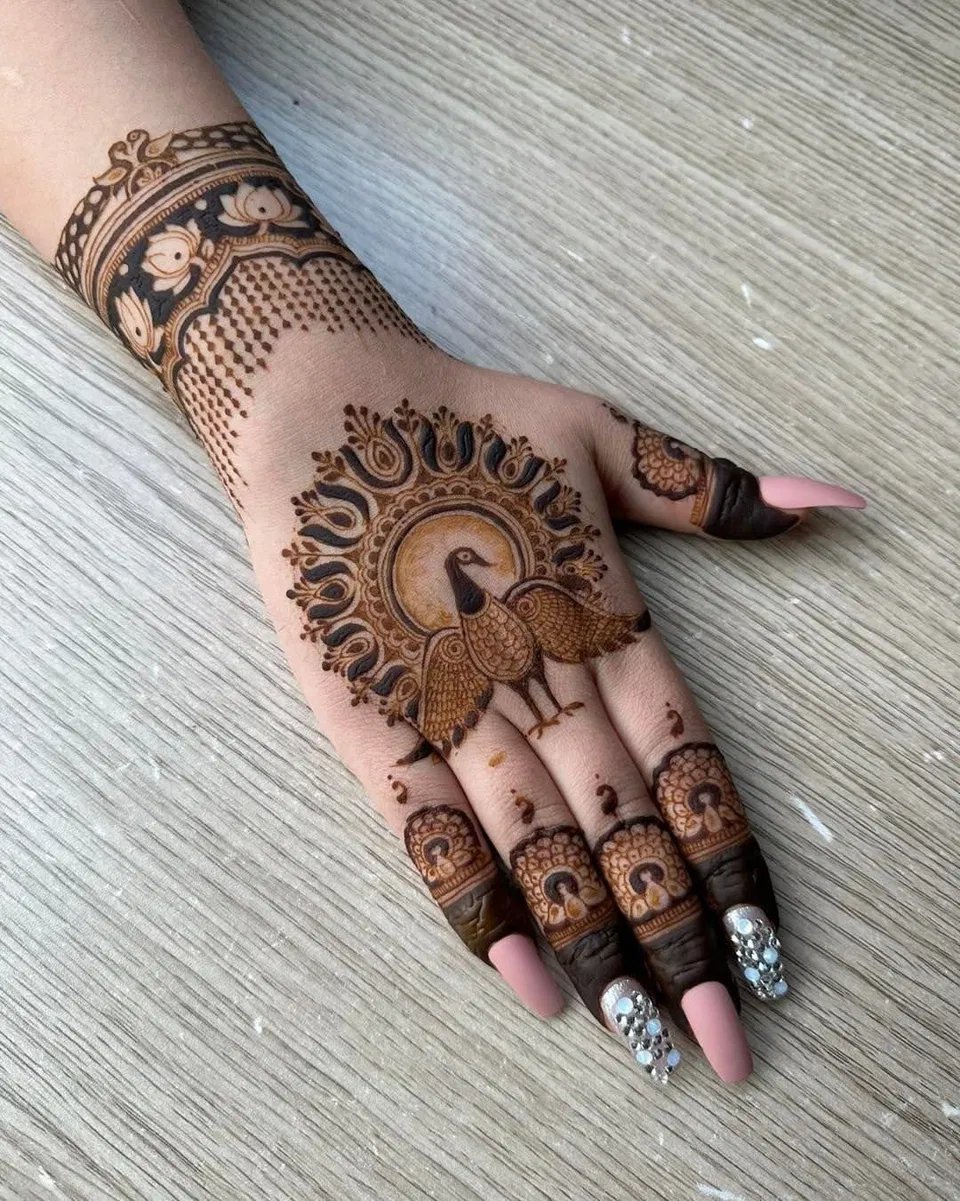 Aesthetic Bridal Back Hand Mehndi Design with Peacock