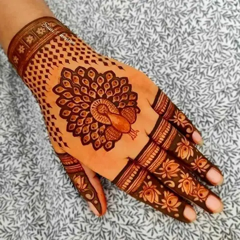 bridal stylish peacock back hand mehndi design