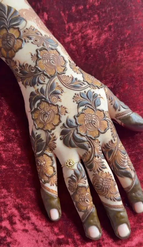 aesthetic arabic flower back hand mehndi design