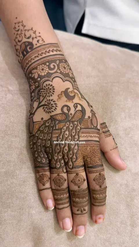 bridal royal peacock back hand mehndi design