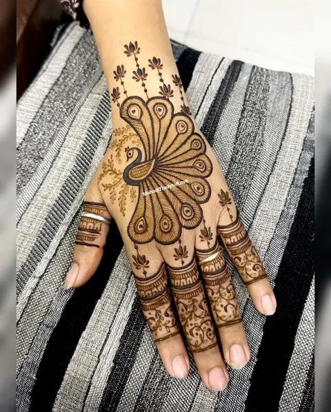 bridal simple figure back hand mehndi design