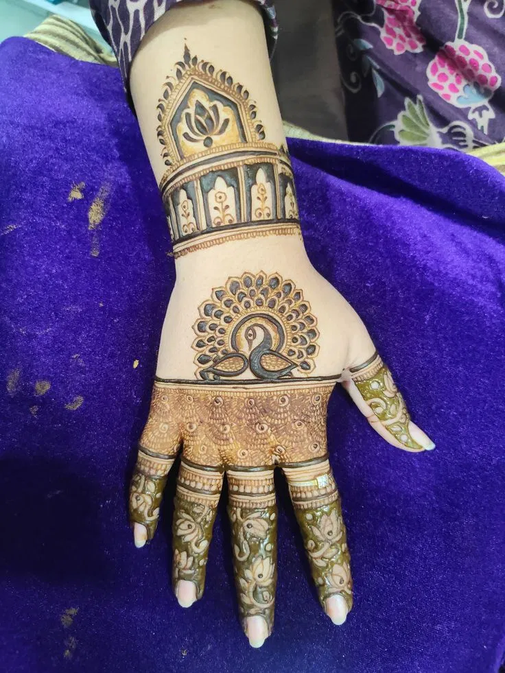 Arabic Bridal Back Hand Mehndi Design with Peacock