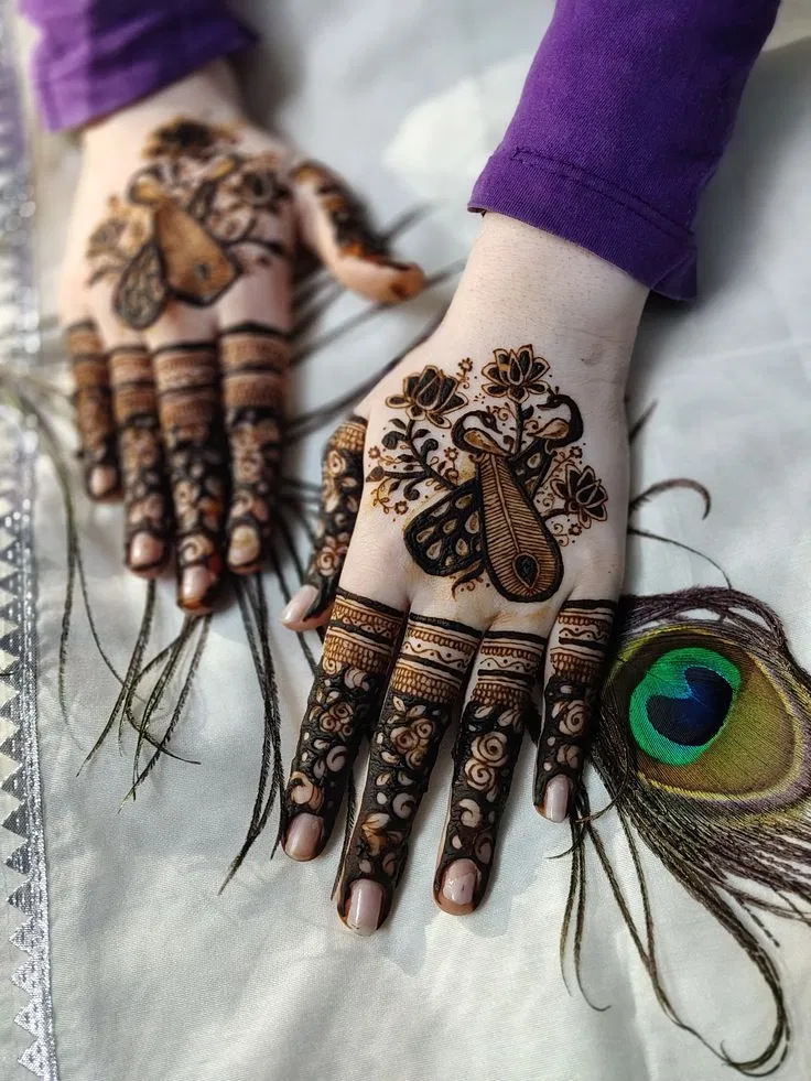 Aesthetic Bridal Back Hand Mehndi Design with Peacock for Engagement (2)