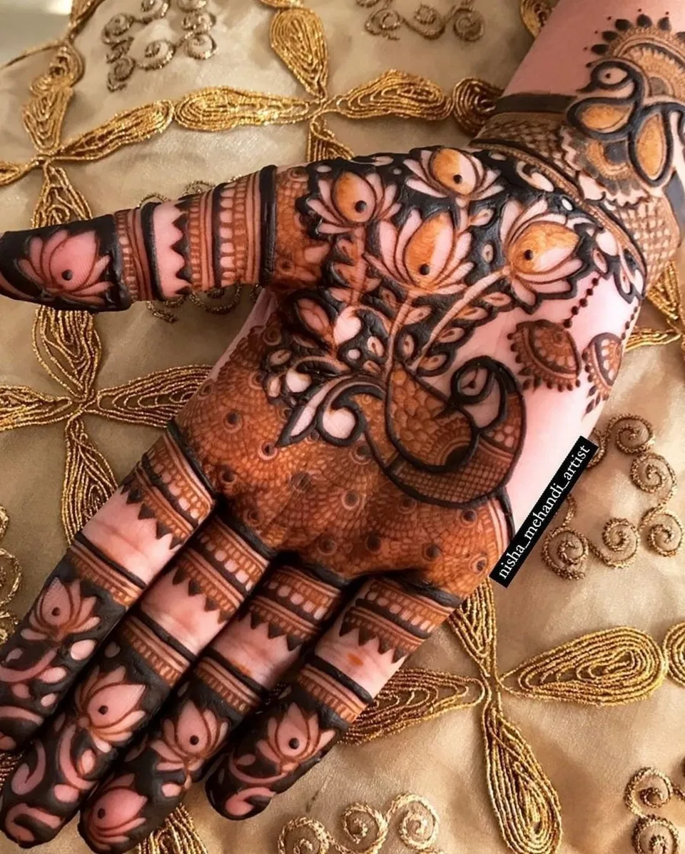 Royal Stylish Back Hand Mehndi Design with Jaal and Peacock