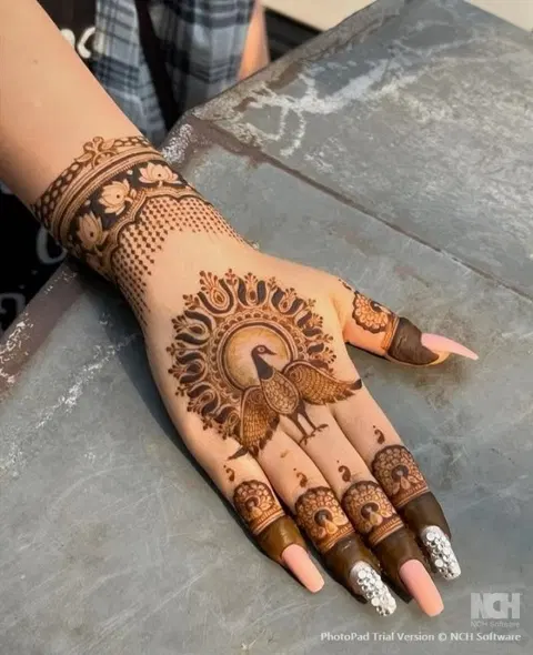 royal simple peacock back hand mehndi design