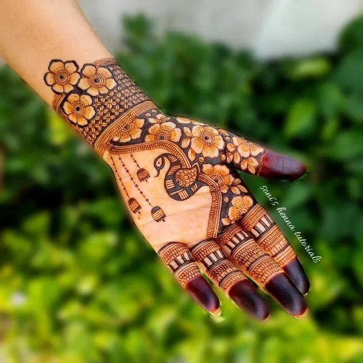 Aesthetic Stylish Back Hand Mehndi Design with Lotus and Peacock