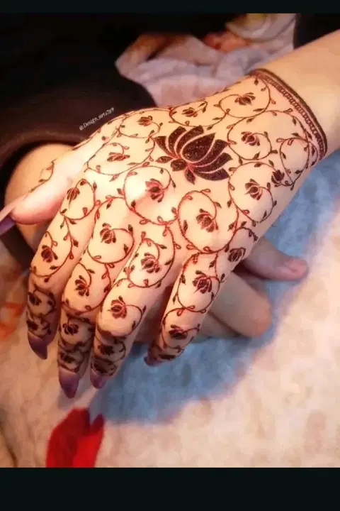 bridal indian flower back hand mehndi design