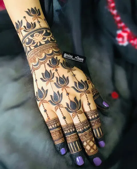 royal stylish deity back hand mehndi design