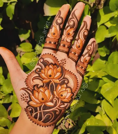 aesthetic royal flower back hand mehndi design
