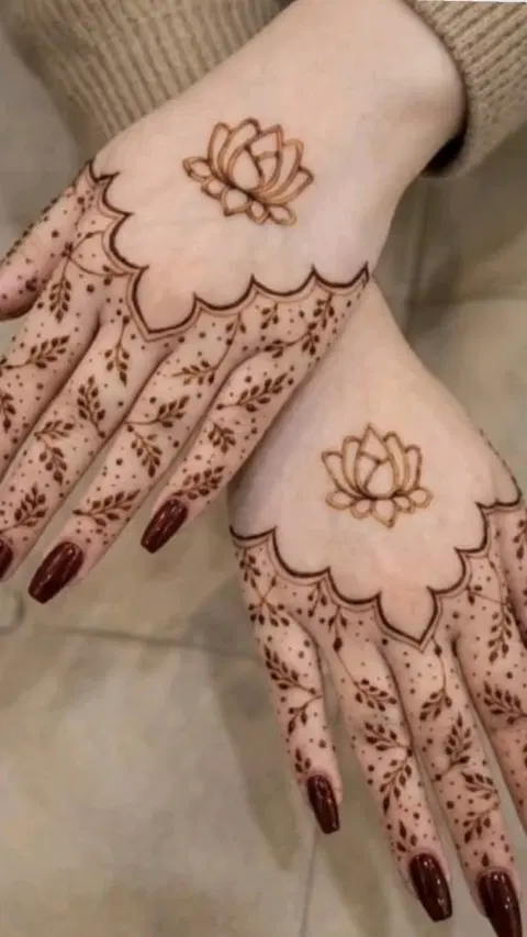 aesthetic minimal flower back hand mehndi design