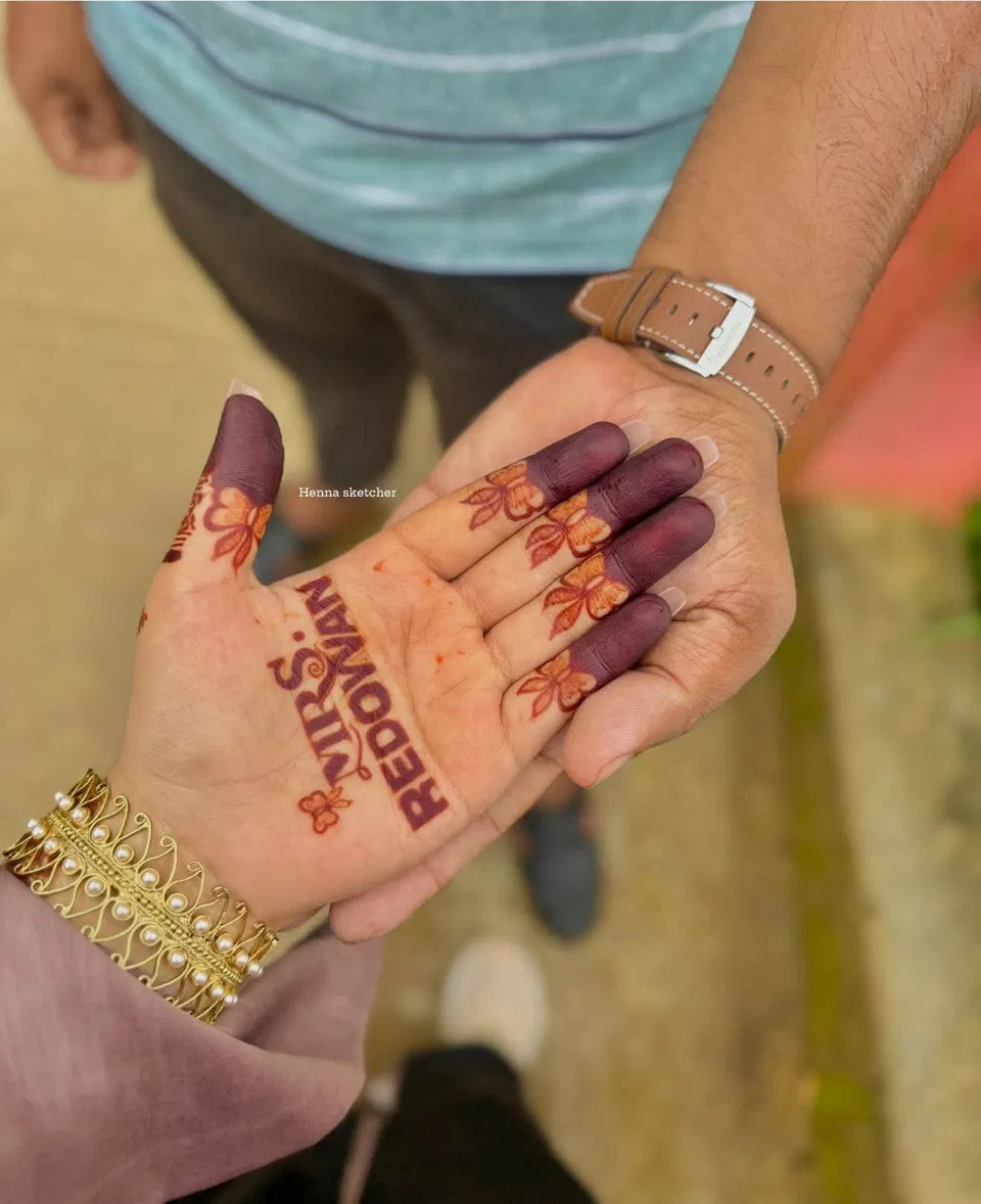 Simple Finger Mehndi Design with Figures and Flowers