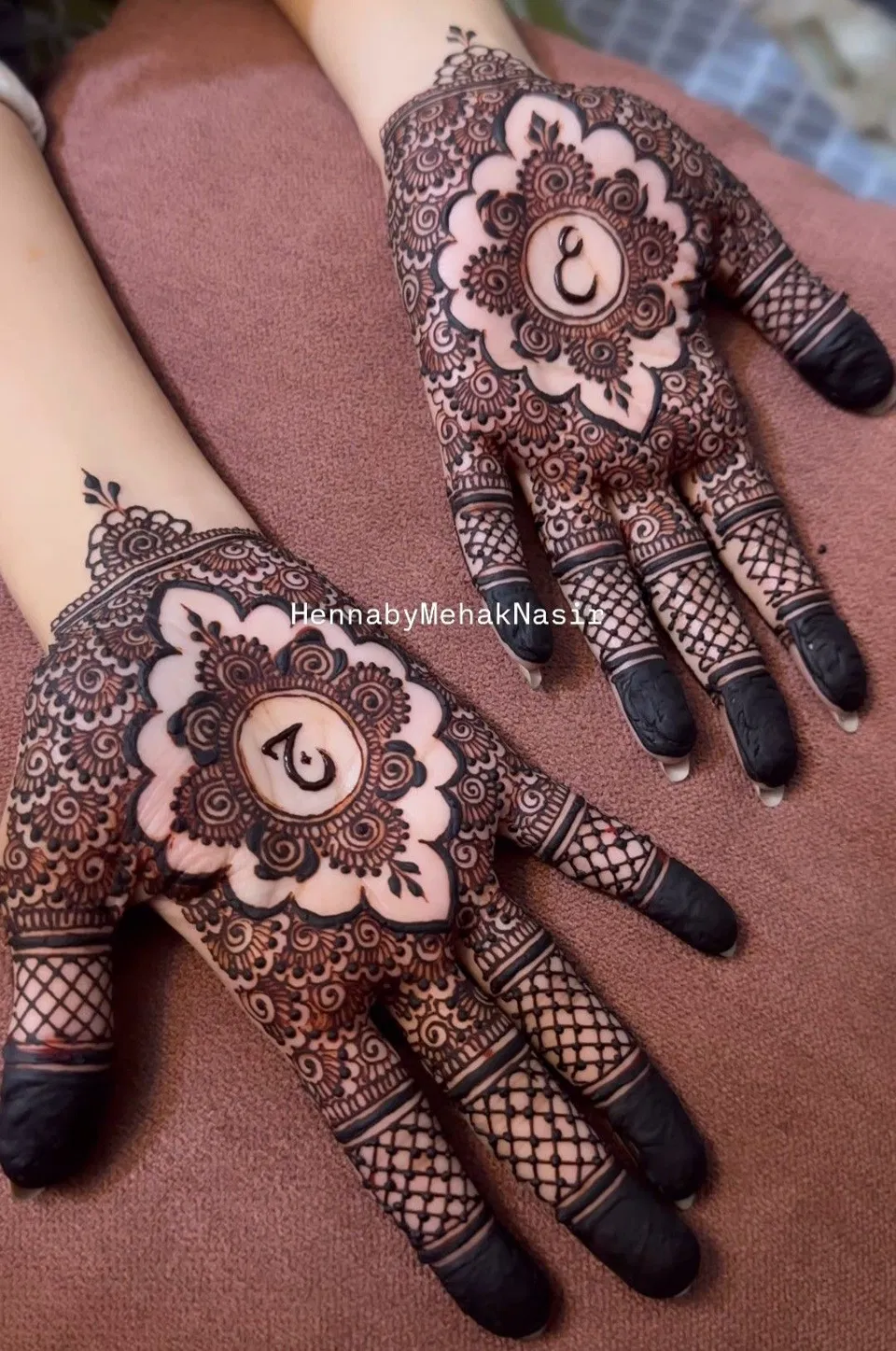 Bridal Back Hand Mehndi Design with Gol Tikki, Figures and Hearts for Eid (2)