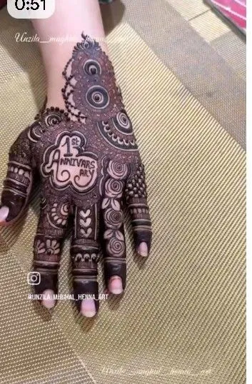 Stylish Mehndi Design with Flowers and Hidden Name