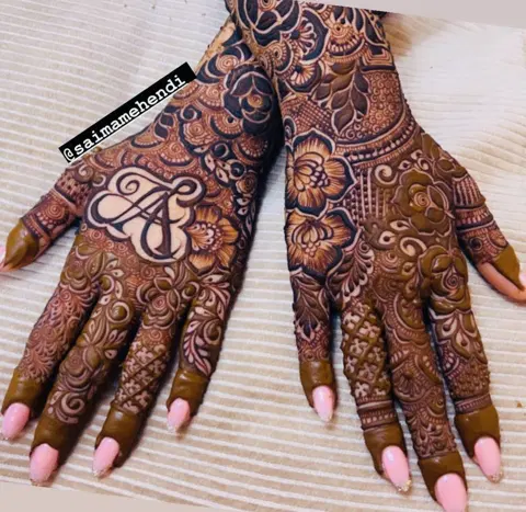 bridal dubai deity back hand mehndi design