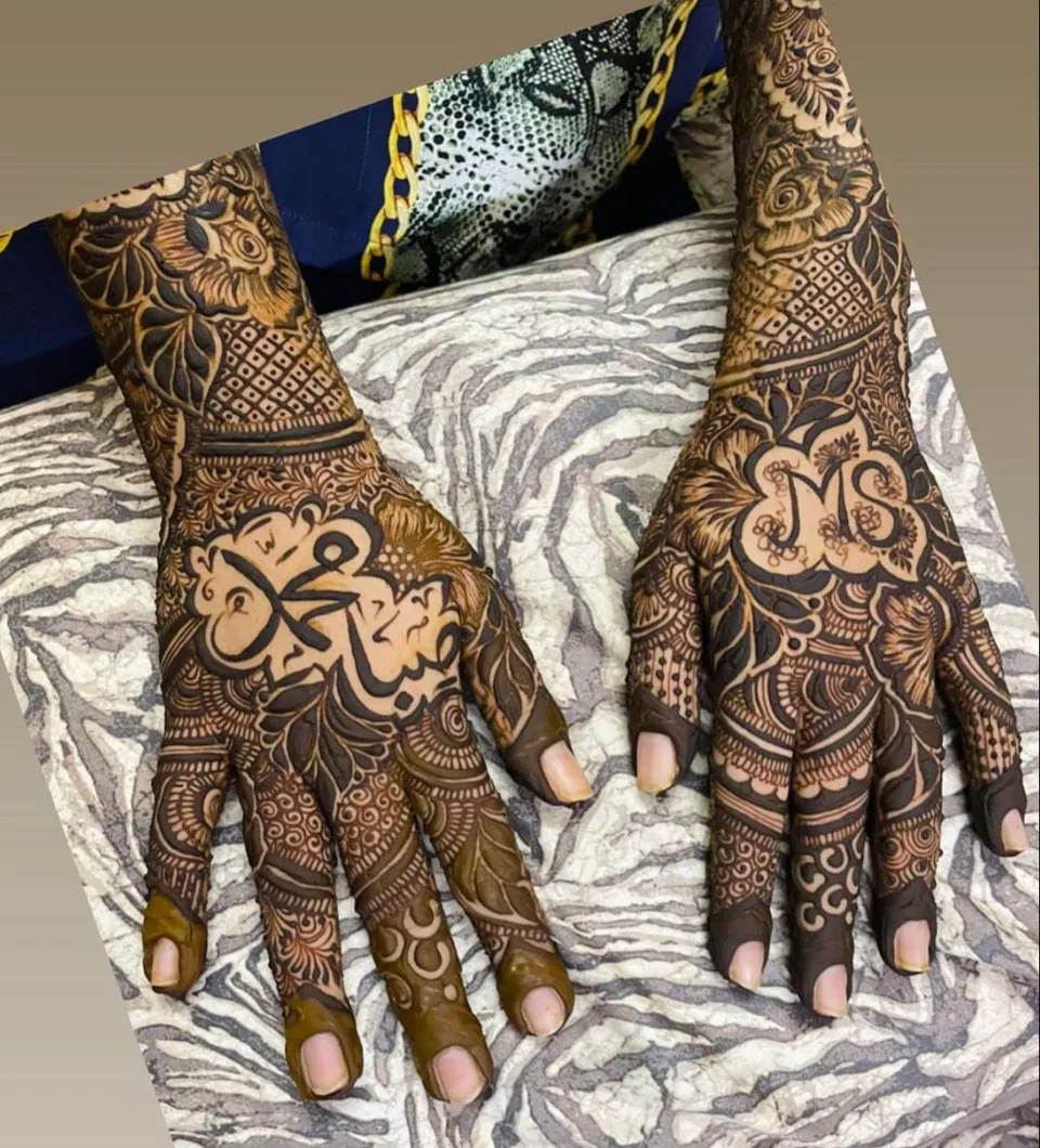 Bridal Back Hand Mehndi Design with Figures, Jaal and Hidden Name for Engagement