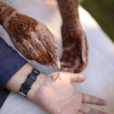 bridal minimal deity full hand mehndi design