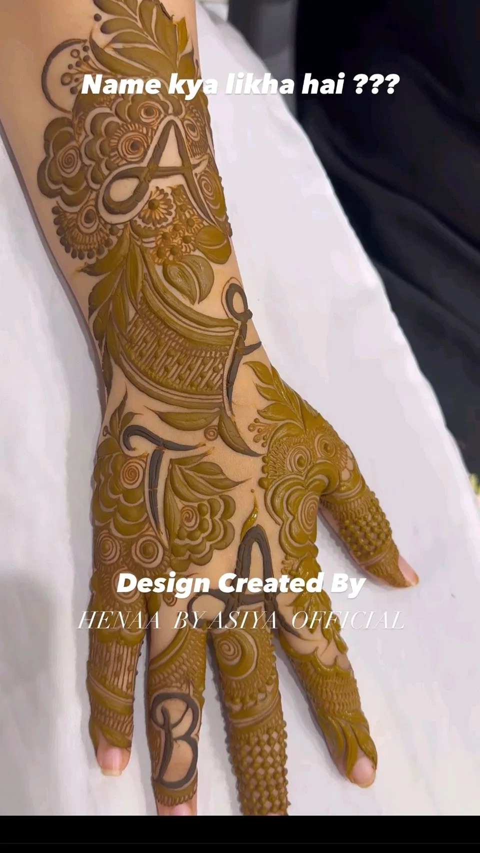 Dubai Back Hand Mehndi Design with Hidden Name
