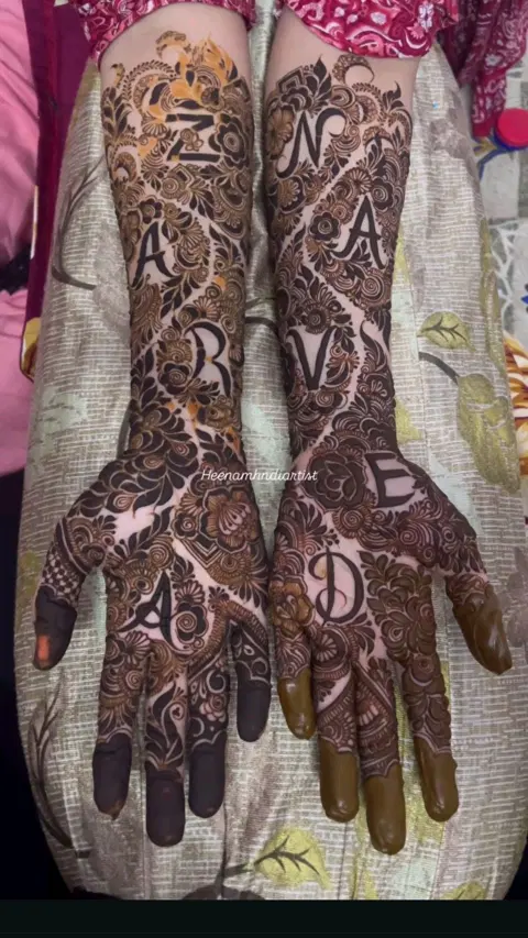 bridal figure back hand mehndi design