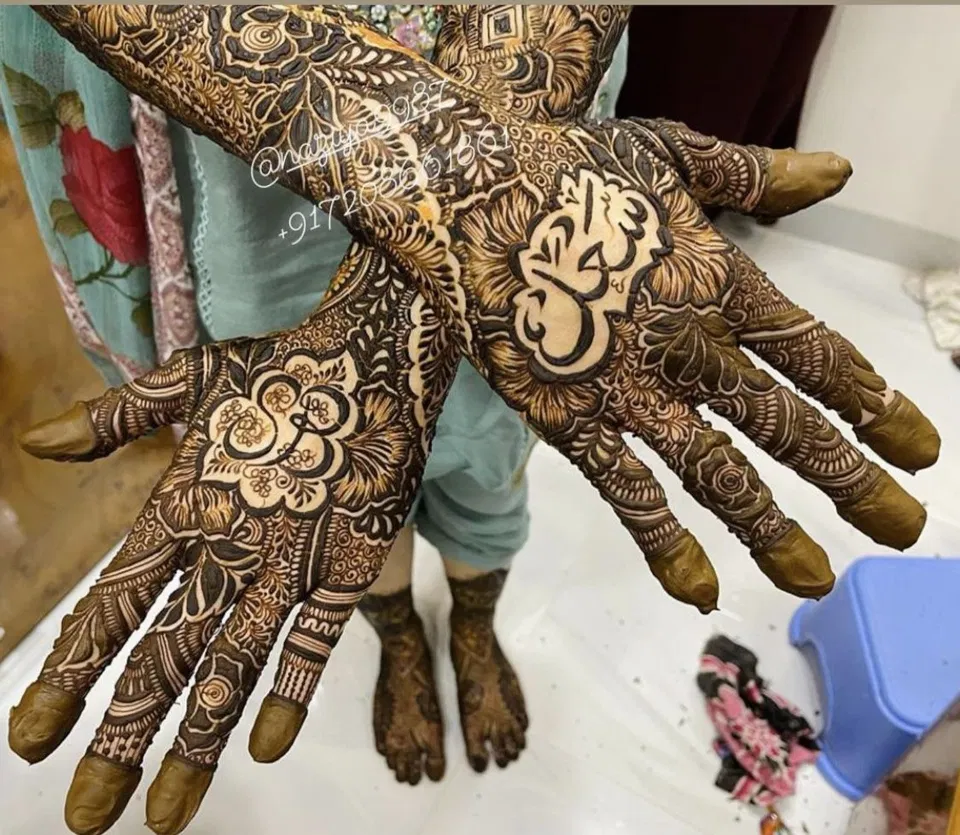 Bridal Back Hand Mehndi Design with Deity, Figures and Hidden Name (2)