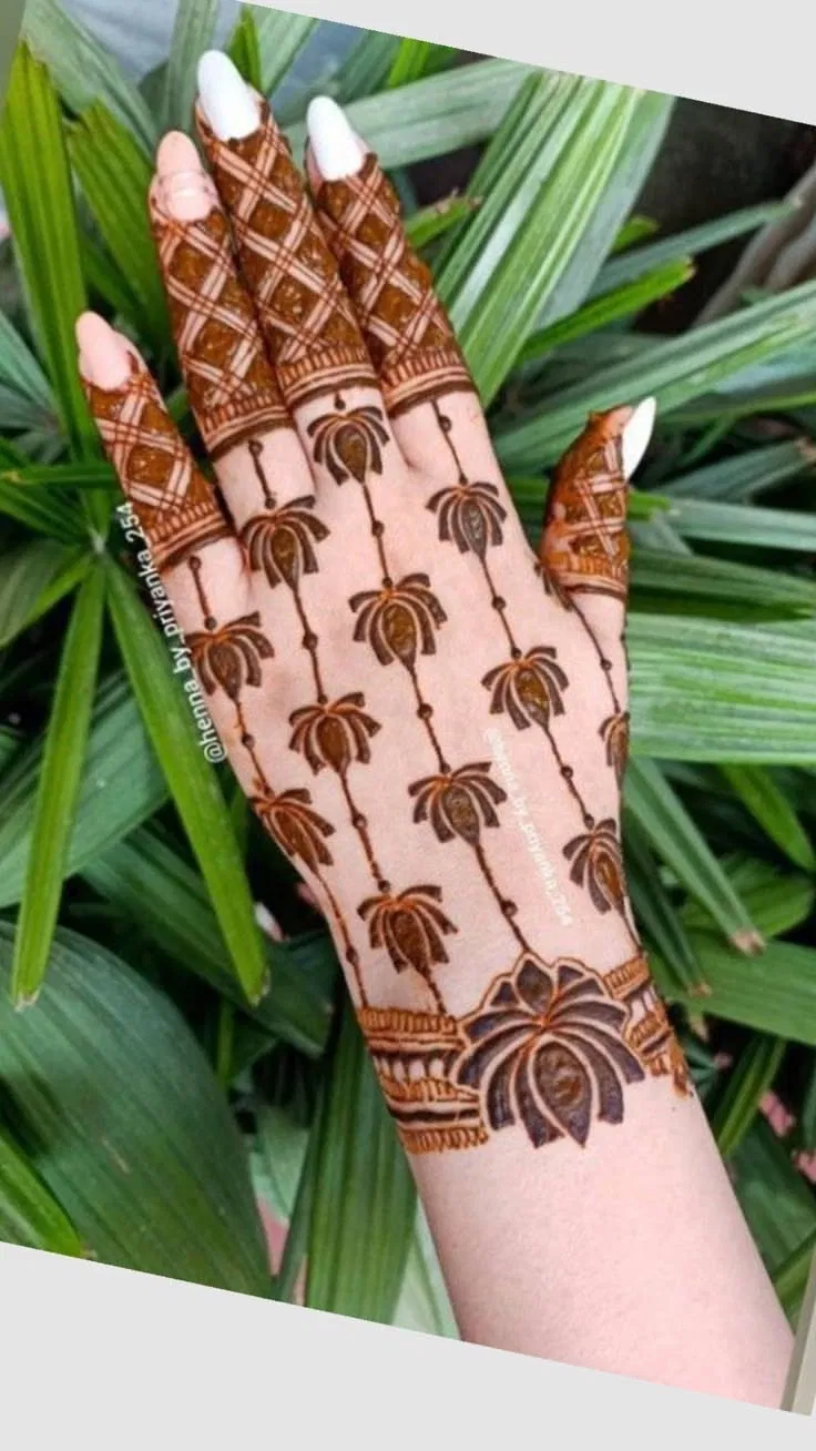 Aesthetic Minimal Back Hand Mehndi Design with Gol Tikki, Jaal and Lotus for Diwali (2)